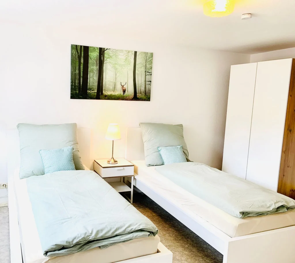 Ferienwohnung MARIE Schlafzimmer mit Doppelbett - Ferienwohnungen in Malterdingen beim Europa Park Schlafzimmer der Ferienwohnung Marie Malterdingen mit Doppelbett
